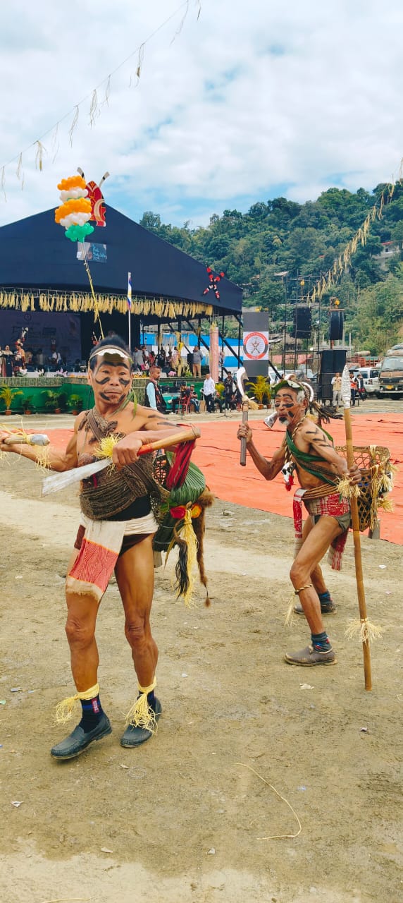 Nocte warriors with dao-swords performing at Chalo Loku Festival, Khonsa, Tirap