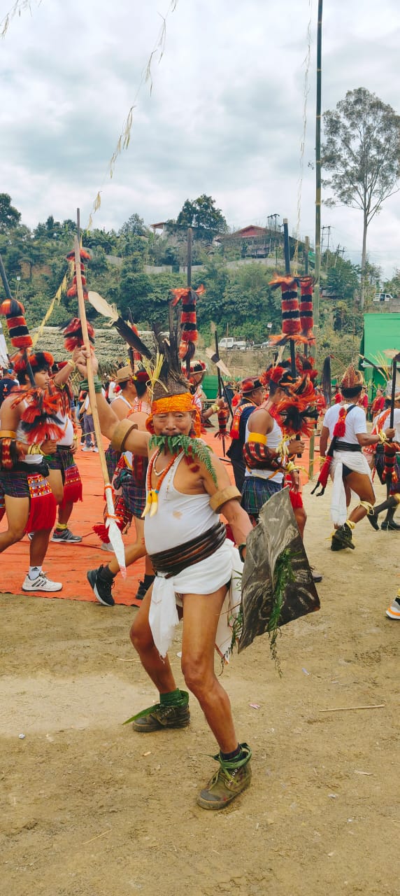 Nocte dancer with ceremonial spear and shield, Chalo Loku Festival